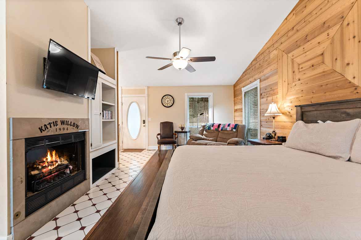 Firefly Glow Cabin #4 Bedroom & Fireplace