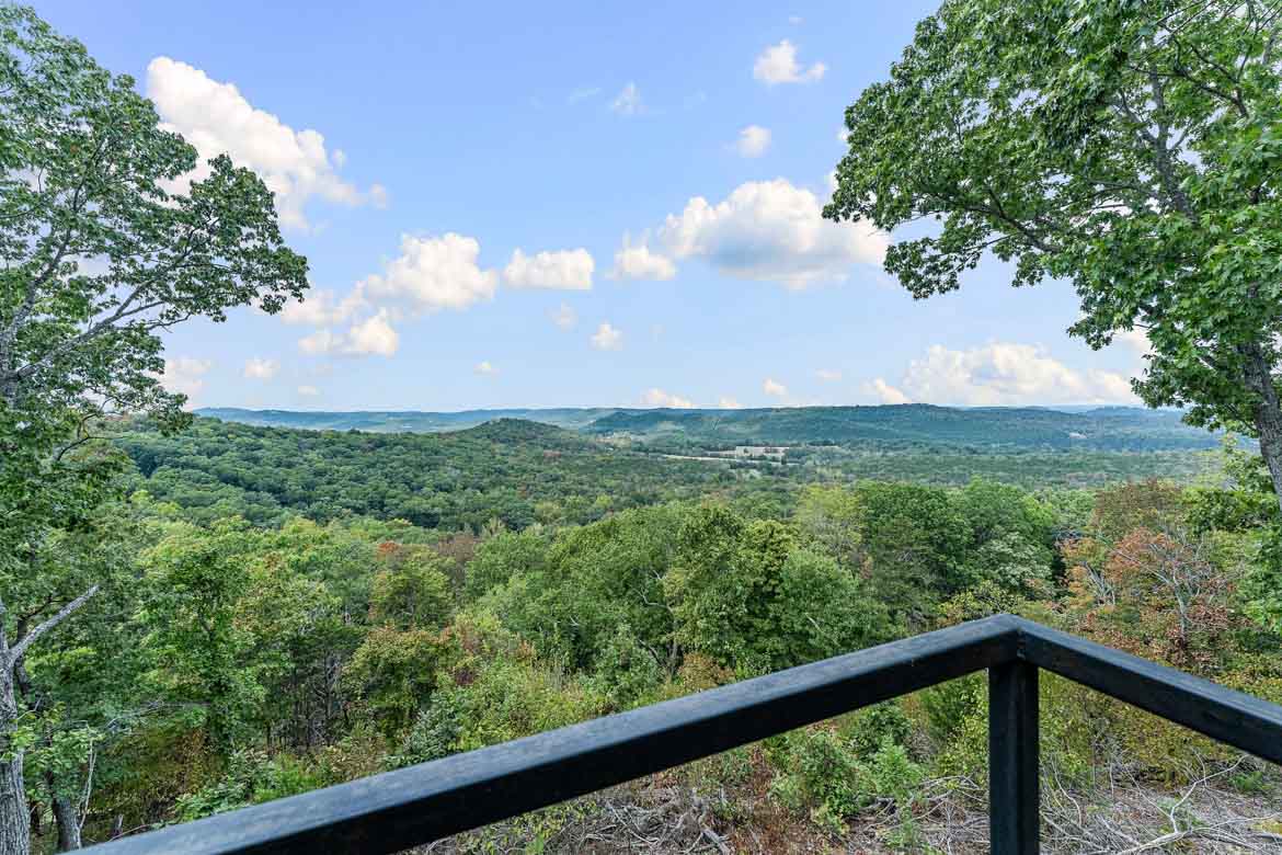a view of the mountains from a balcony